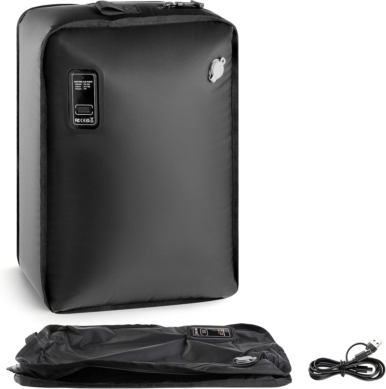 Open suitcase packed with MOUNTRAX vacuum bags and clothing on a hotel bed with window light
