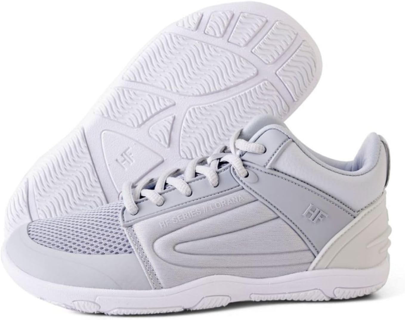 Macro close-up of Lorana sneaker sole showing zero-drop flexible arch and textured rubber tread