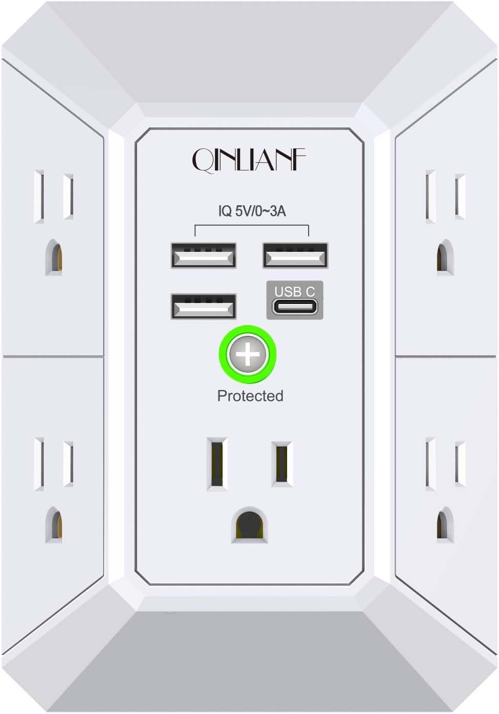 QINLIANF power strip plugged into wall in a home office corner with desk items and natural light