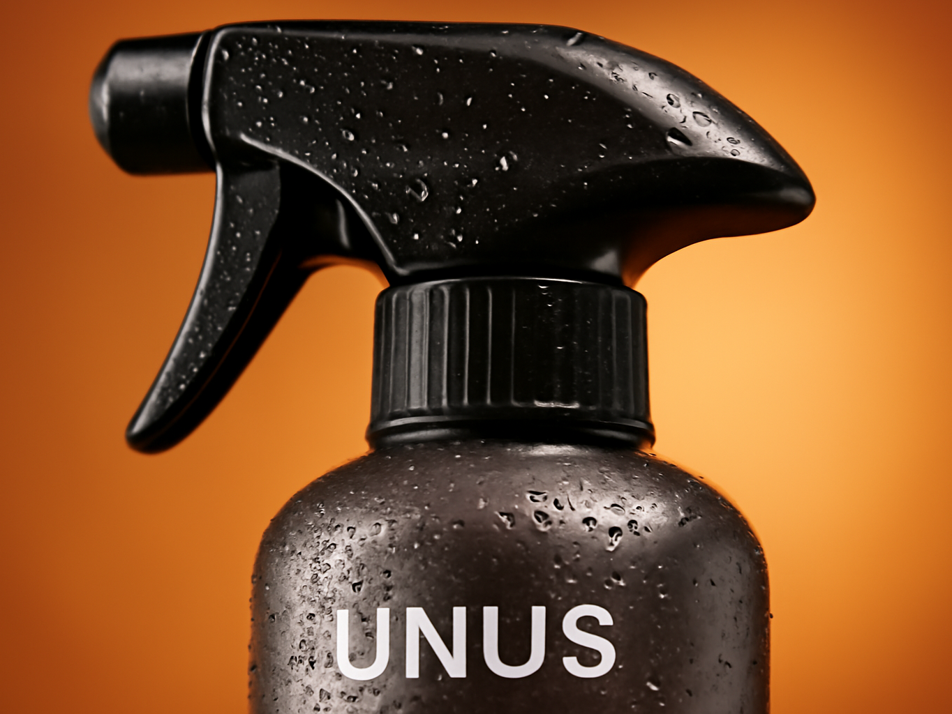Macro detail of shoe freshness spray bottle nozzle with water droplets, shallow focus