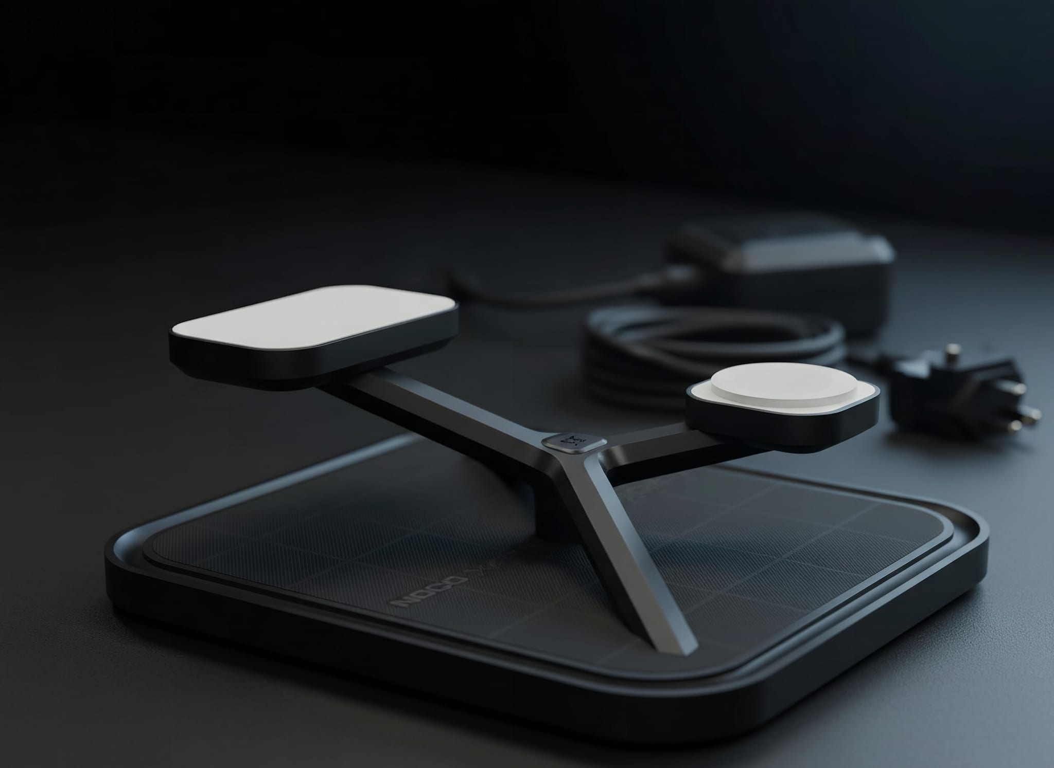 NOCO XGrid XDS3 macro detail showing magnetic alignment rings and wireless charging coils in sharp focus