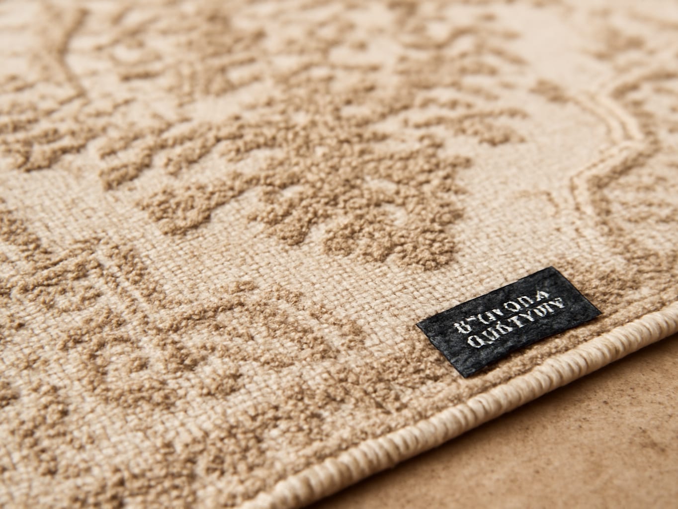 Macro detail of beige boho rug weave and low pile texture in close-up