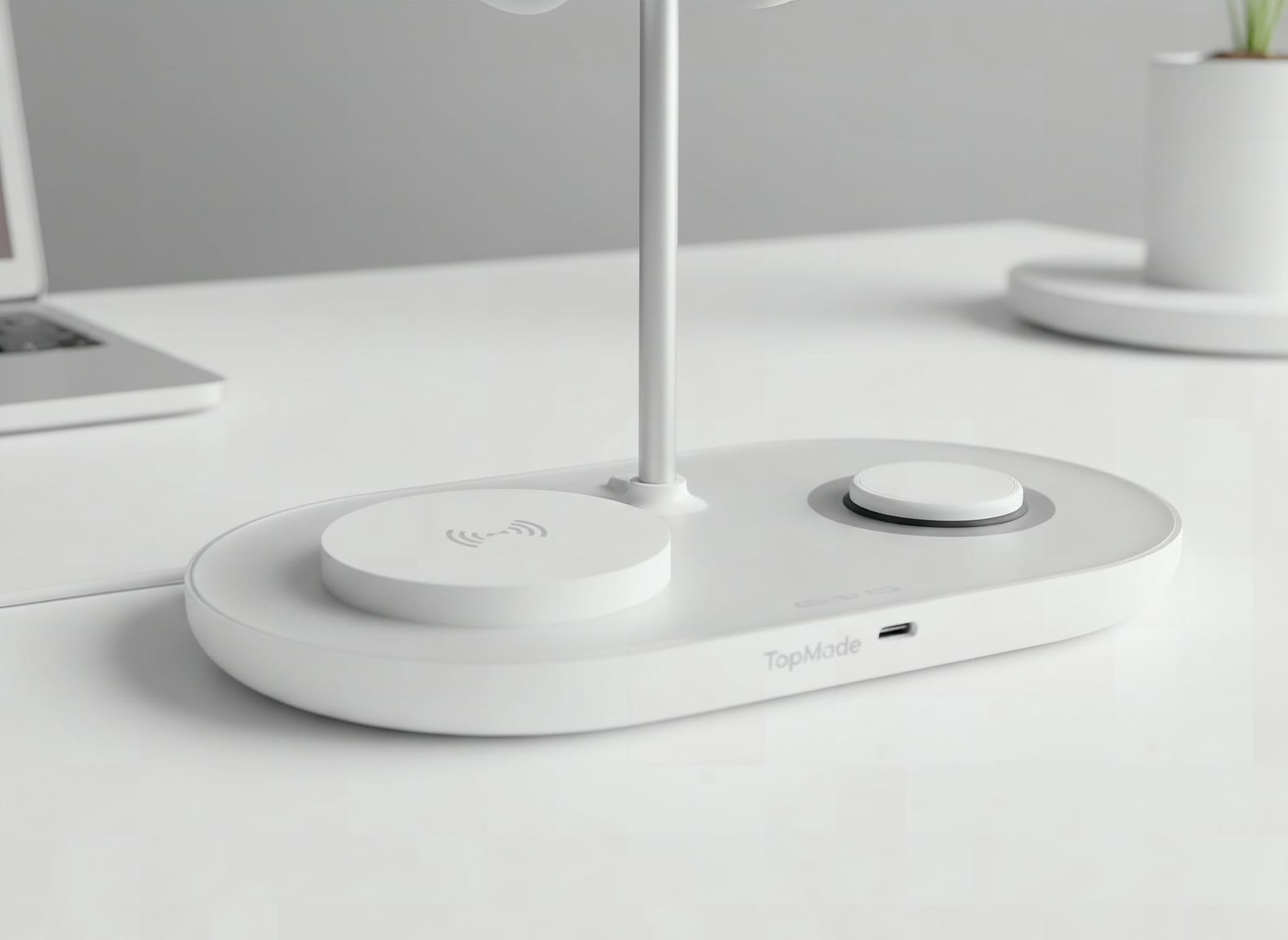 Close-up of TopMade charger stand's 15W wireless charging pad and connector ports with white finish
