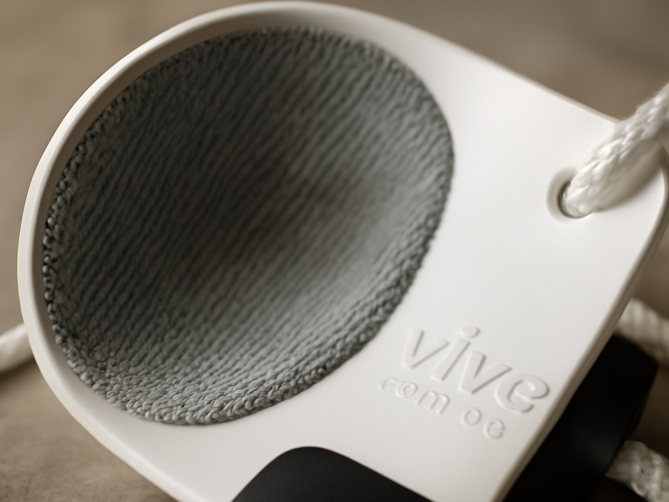 Macro detail of Vive Sock Aid's fabric interior and heel cup, shallow focus on material texture